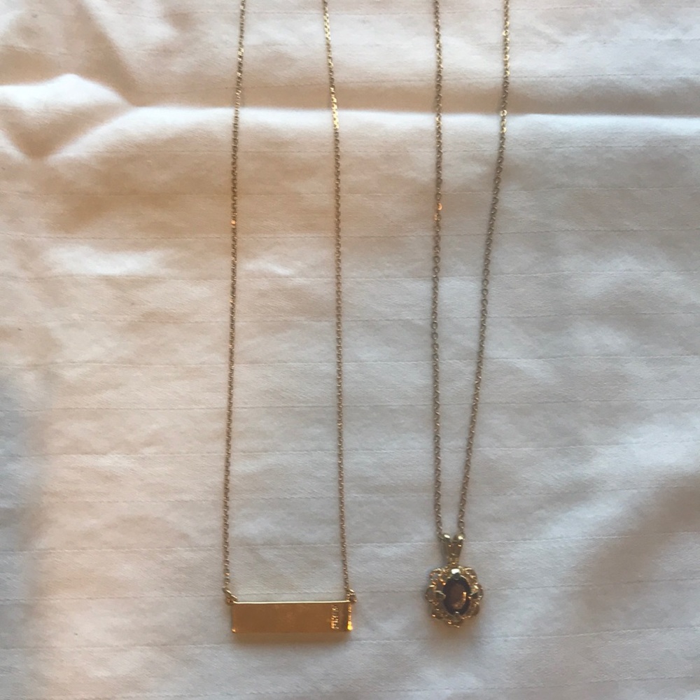 A set of new gold tone necklaces